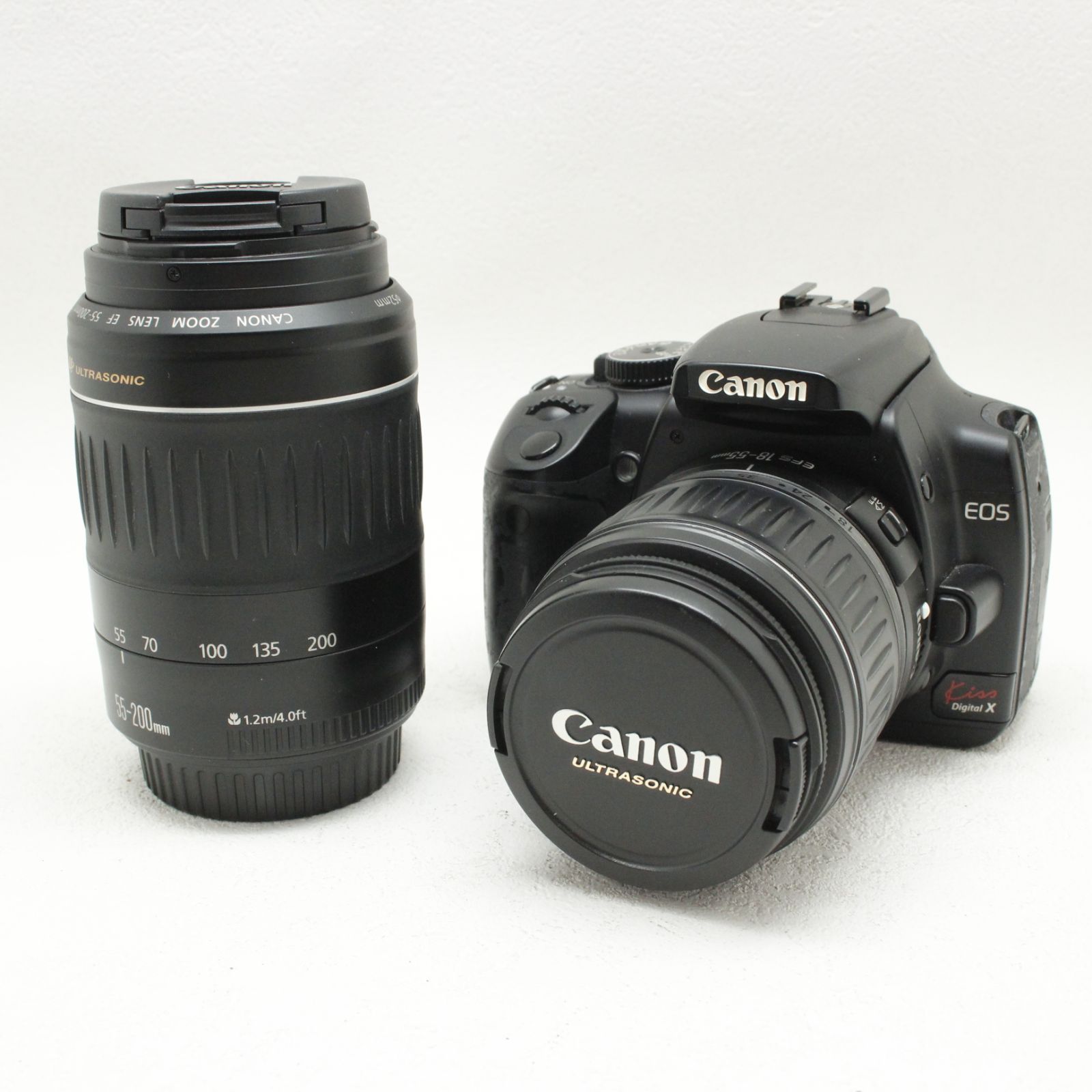 少し訳あり 【Canon EOS Kiss digital X ダブルレンズ】 訳あり】Canon EOS Kiss Digital X ダブルズームキット - メルカリ