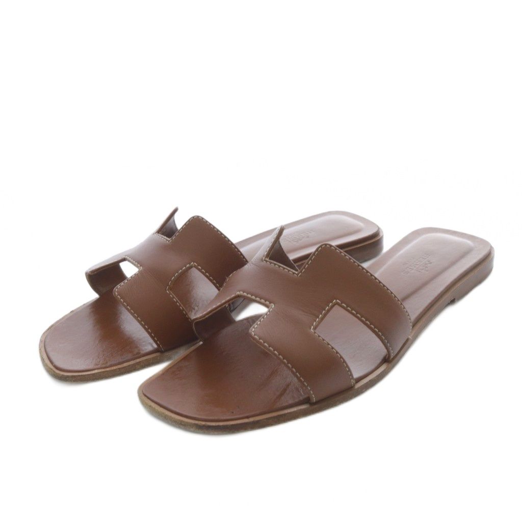 エルメス HERMES オラン サンダル フラット レザー 37.5 ブラウン PE021056Z |YO9