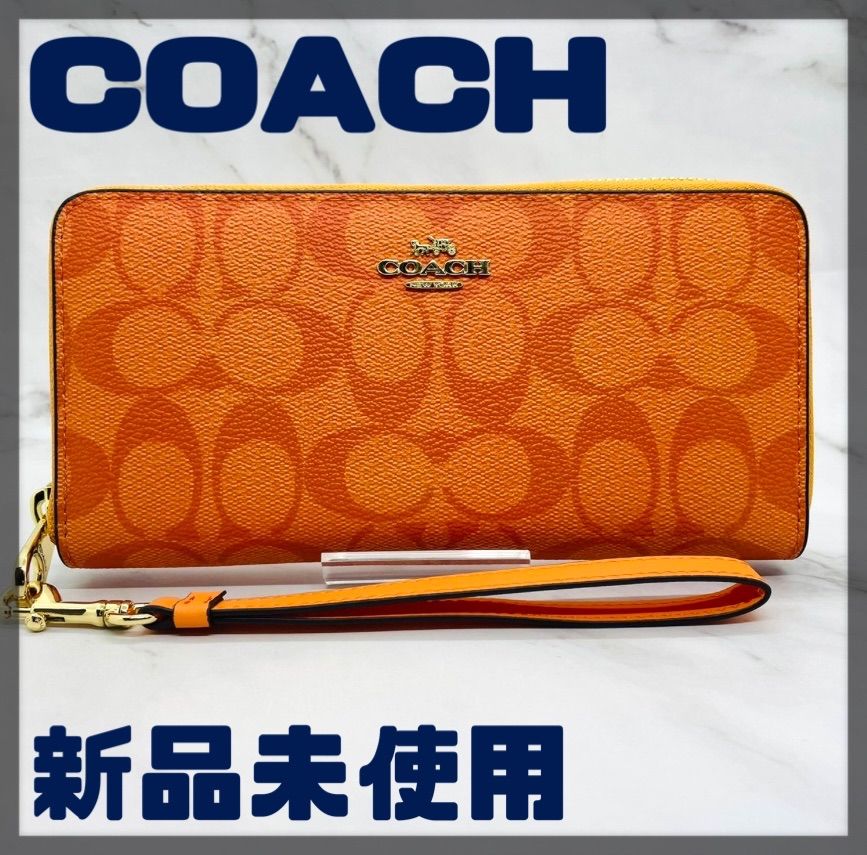 COACH】コーチ 長財布 シグネチャーストラップ付き オレンジ