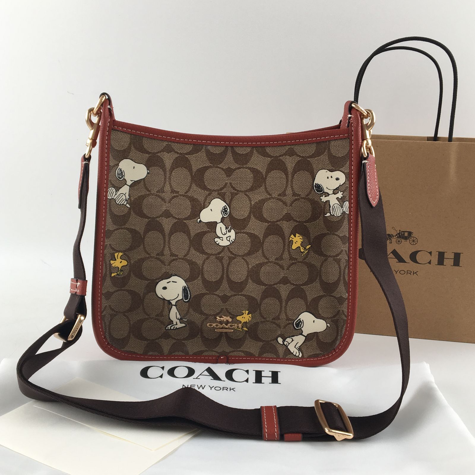 新品 COACH コーチ x ピーナッツ デンプシー ファイル バッグ