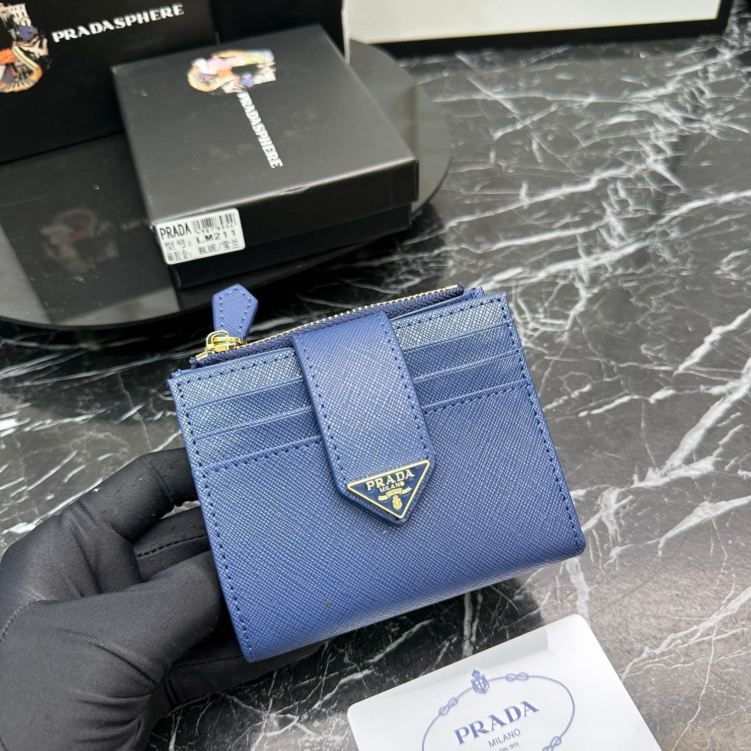 新品未使用】プラダ（Prada）二つ折り財布 ブルー - メルカリ