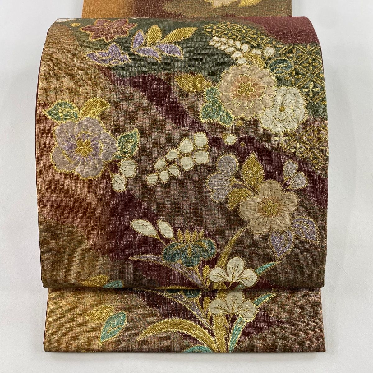 袋帯 秀品 草花 霞 箔 金通し 茶紫 お太鼓柄 正絹