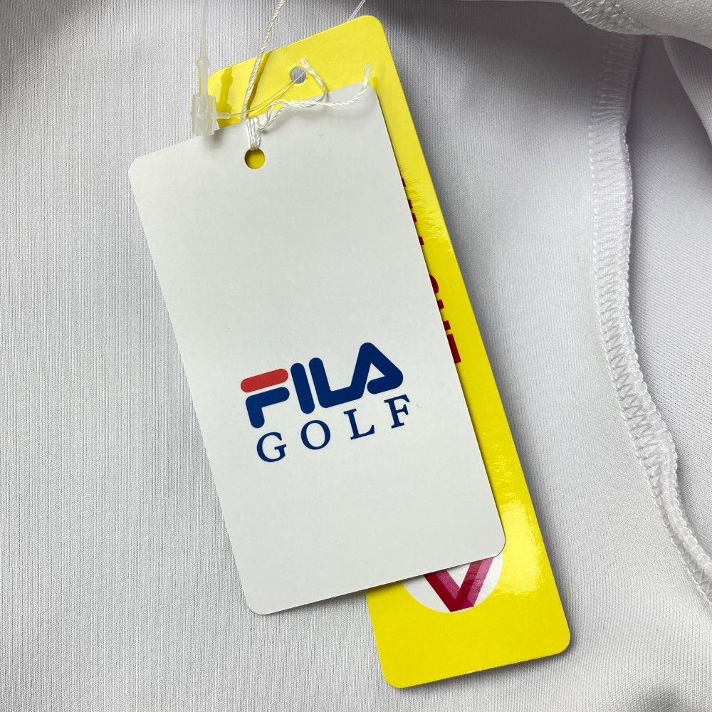 サイズ：L FILA GOLF フィラゴルフ  ビックロゴ ニットセーター 総柄 ホワイト系 [240101424899] ゴルフウェア メンズ ストスト サイズ：L FILA GOLF フィラゴルフ 裏起毛ハイネック長袖Tシャツ
