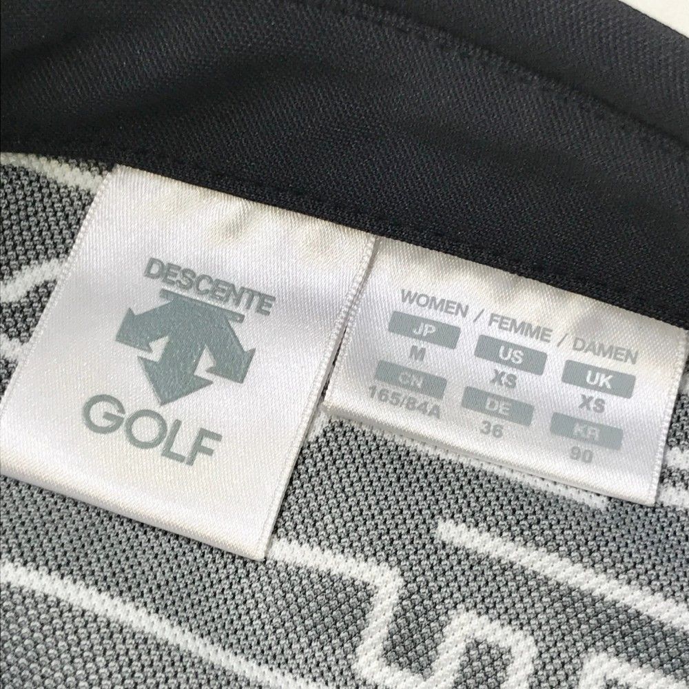 サイズ：M DESCENTE GOLF デサントゴルフ  ノースリーブポロシャツ 総柄 ブラック系 [240101435011] ゴルフウェア レディース ストスト DESCENTE GOLF 【超美品】デサントゴルフ ノースリーブ