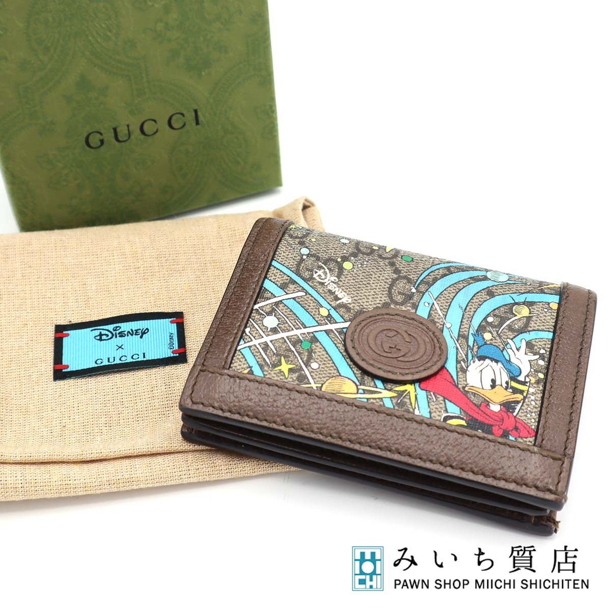 【極美品・希少】グッチ × ディズニー 2つ折り財布 GGスプリーム ドナルド GUCCI - 本物 グッチ GUCCI × ディズニー Disney ドナルドダック