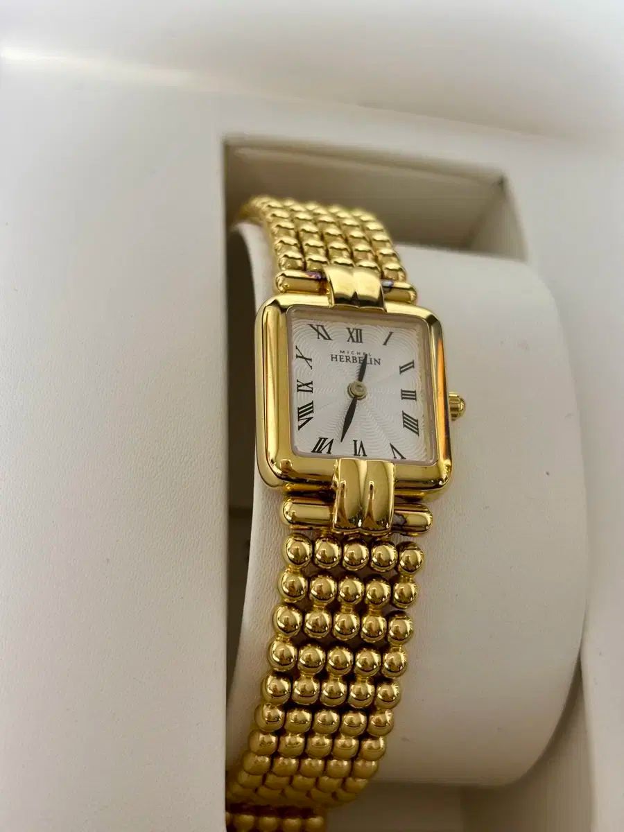 ミッシェル エブラン 女性 ゴールド メタル 時計