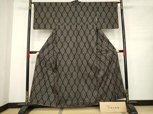 平和屋本店□極上 本塩沢 やまだ織 単衣 中島たまい作 格子 黒地 証紙