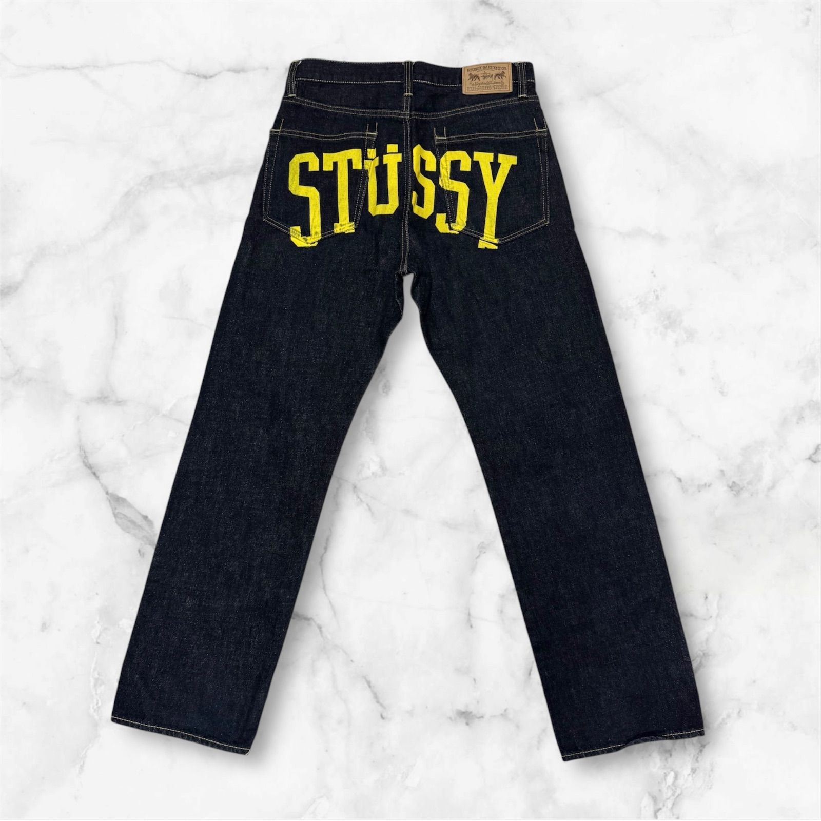 超希少」STUSSY ペイントロゴ デニムパンツ インディゴ - メルカリ