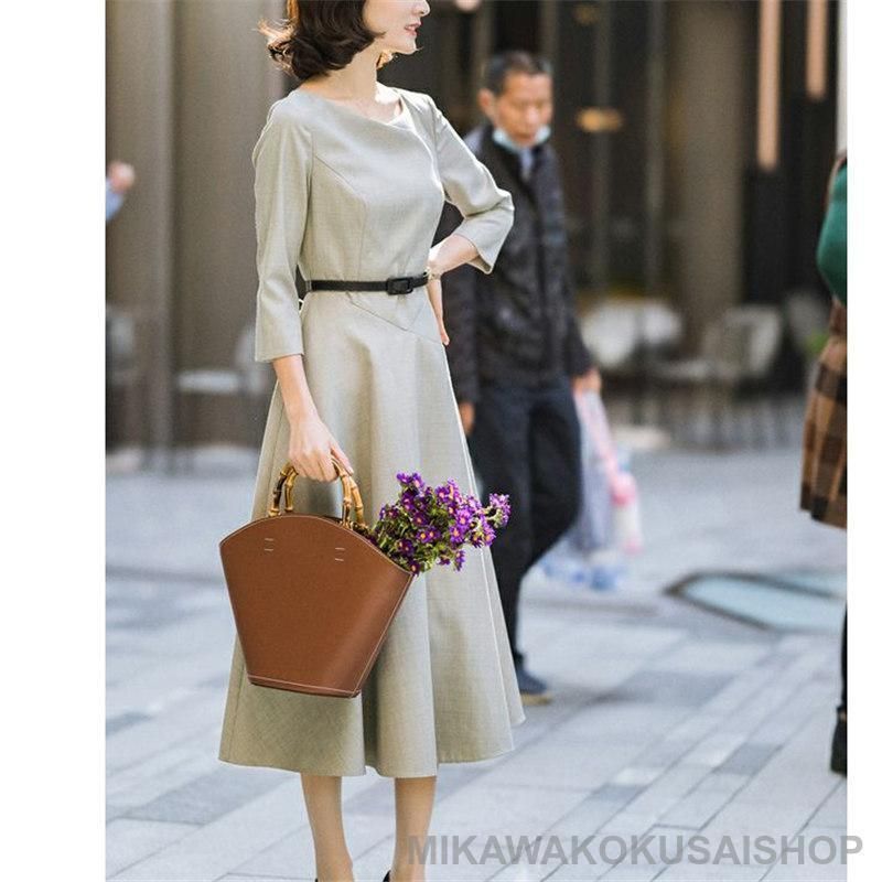 ポルテデブトン ロングコート ノーカラー ヘリンボーン シェルボタン コクーン ポルテデブトン ロングコート ノーカラー ヘリンボーン シェル