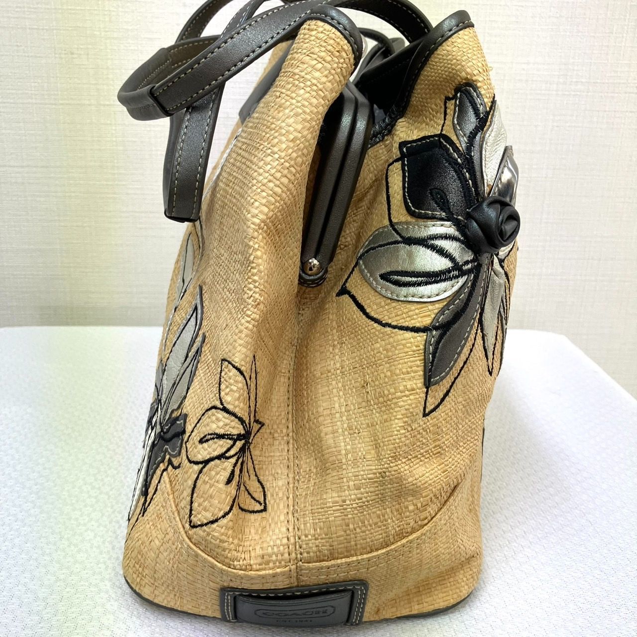 COACHストロートートバッグ　フラワーハンプトンズ COACH がま口 トートバッグ ストロー フラワー ハンプトンズ