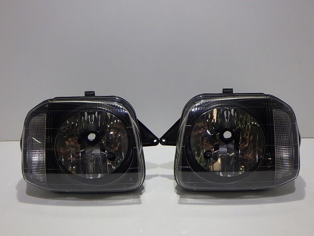 ジムニー ヘッドライト左右 ハロゲン JB23W 100-32647 N レベ無 コーティング 比較的 251001001