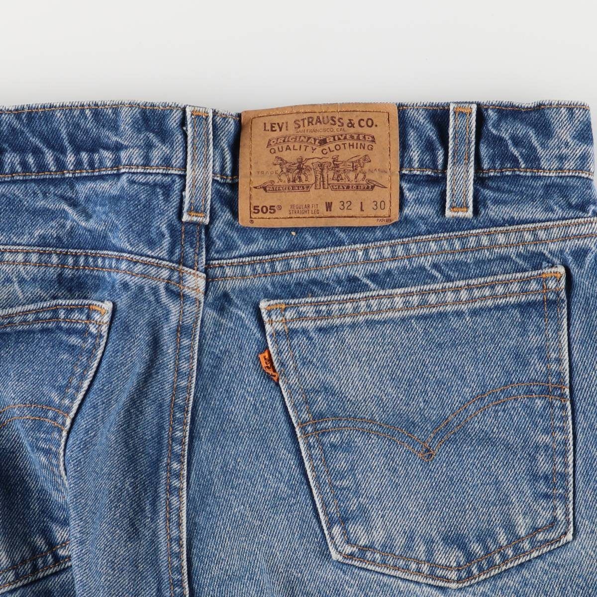 テーパードデニムパンツ