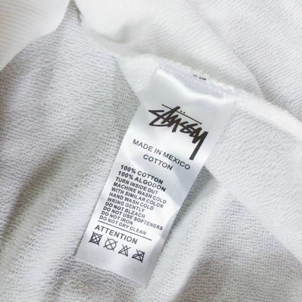 STUSSY ステューシー スカルプリントのクルーネックセーター