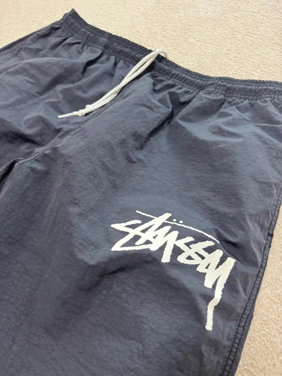Nike(ナイキ） X STUSSY(ステューシー) ビーチパンツ オフ