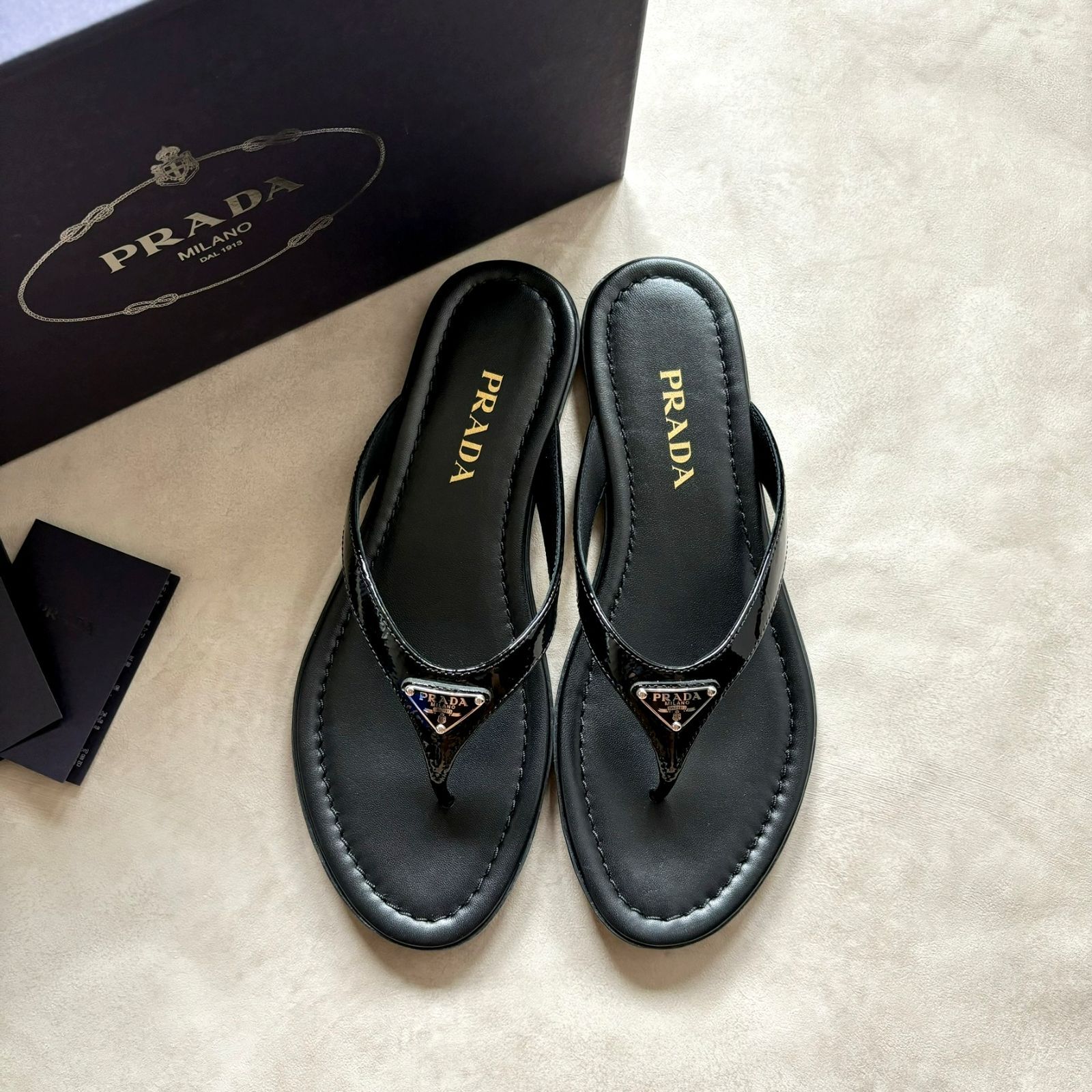 未使用 prada サンダル 37 PRADA - PRADA(プラダ) サンダル 37 1/2 レディース美品 ソフト