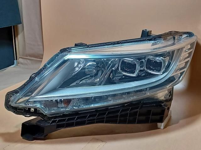 コーティング済 オデッセイ RC2 左ヘッドランプ ヘッドライト G 4WD 8人 コイト 100-18075 33150-T6A-N01 NH704M