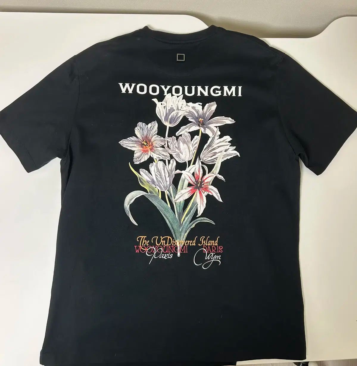 WOOYOUNGMI(ウーヨンミ) 24ss バックロゴ フード付き ジップアップ 