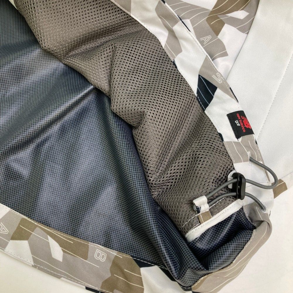 サイズ：6 NEW BALANCE GOLF ニューバランス  フルジップ シェルパーカー カモフラ柄 ホワイト系 [240101443084] ゴルフウェア メンズ ストスト サイズ：6 NEW BALANCE GOLF ニューバランス フルジップ シェル