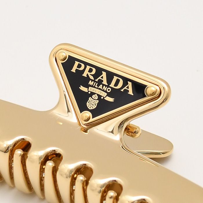 PRADAメタルヘアクリップ PRADA プラダ メタル ヘアクリップ - メルカリ
