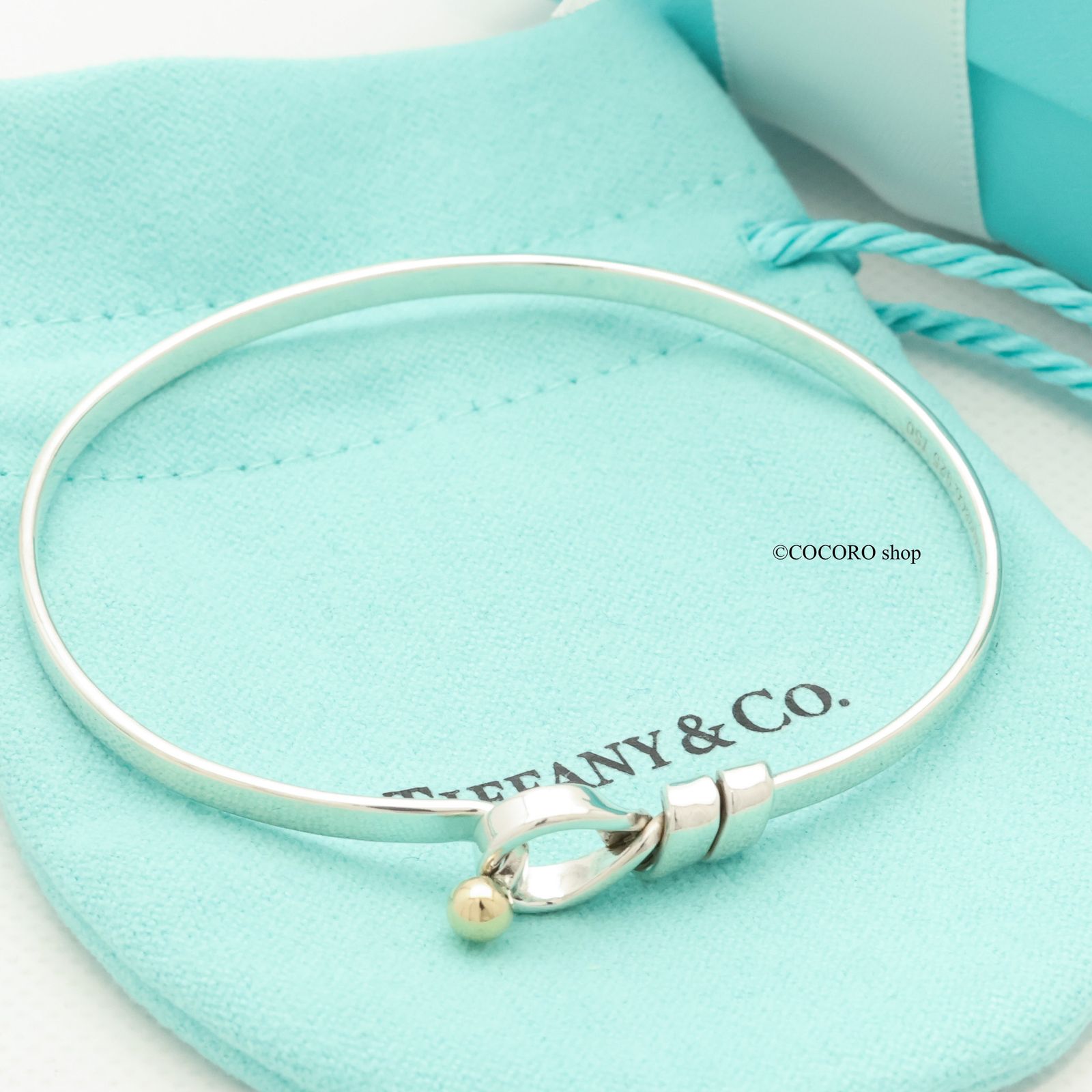 翻译此页 TIFFANY&Co ティファニー フック&アイ バングル ラブノット