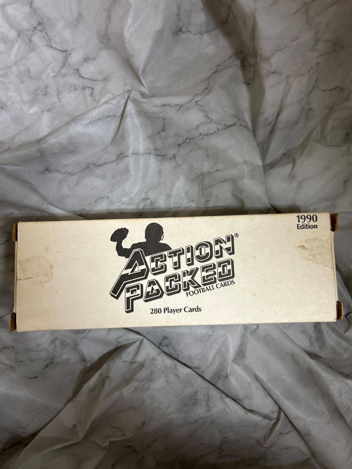 Collectors edition box of 1990 NFL Action Packed football trading cards.