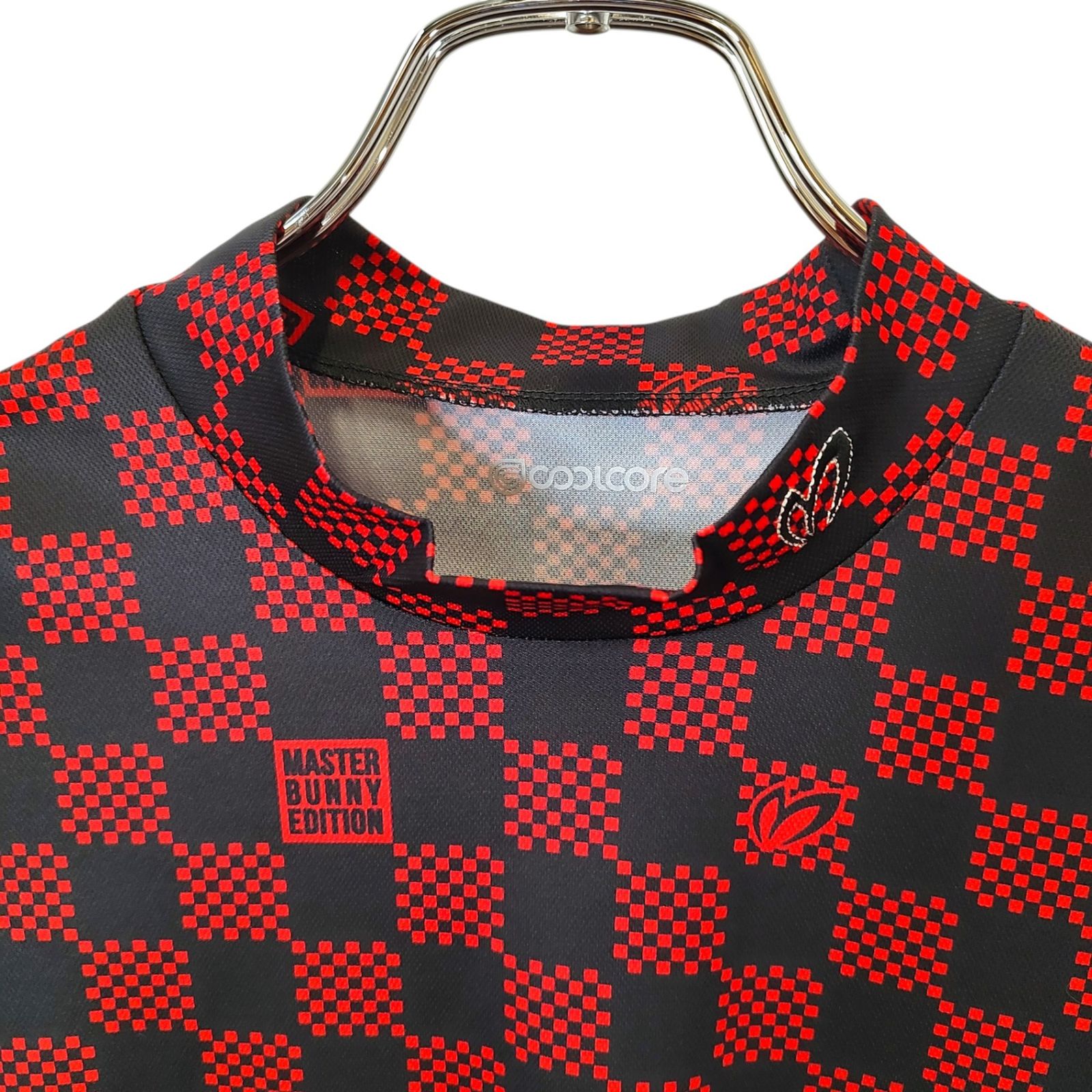 サイズ：1 MASTER BUNNY EDITION マスターバニーエディション ; 759-2267604 モックネック 半袖Tシャツ 総柄 ブラック系 [240101428653] ゴルフウェア レディース ストスト トリコットジャガード モックネックラグランカットソー | MASTER