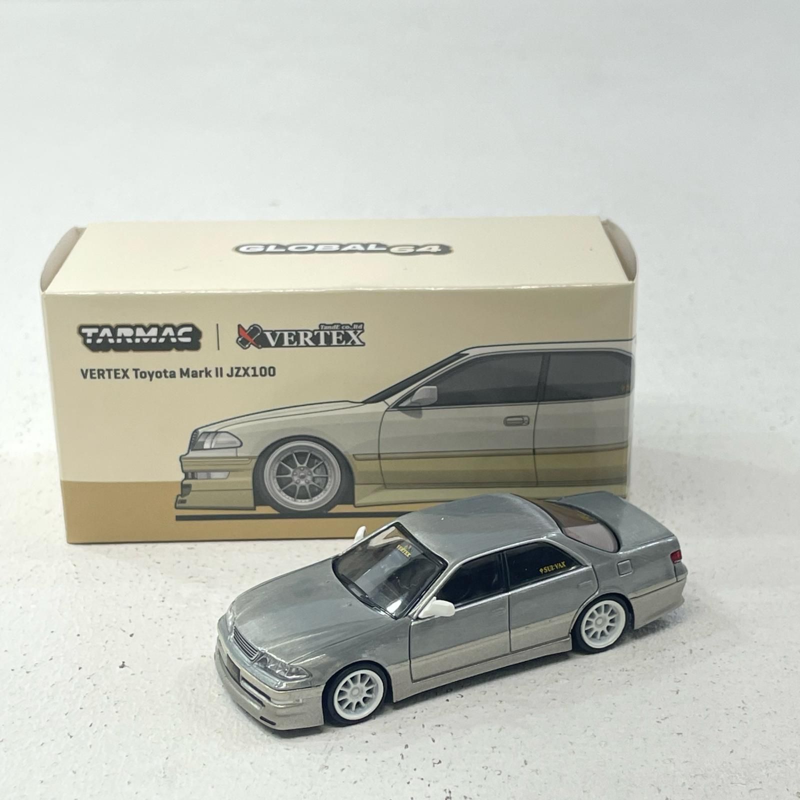 ターマックワークス 1/64 ベルテックスマーク2JZX100 ホワイト Amazon | TARMACWORKS 1/64 VERTEX Toyota Mark II JZX100 Light