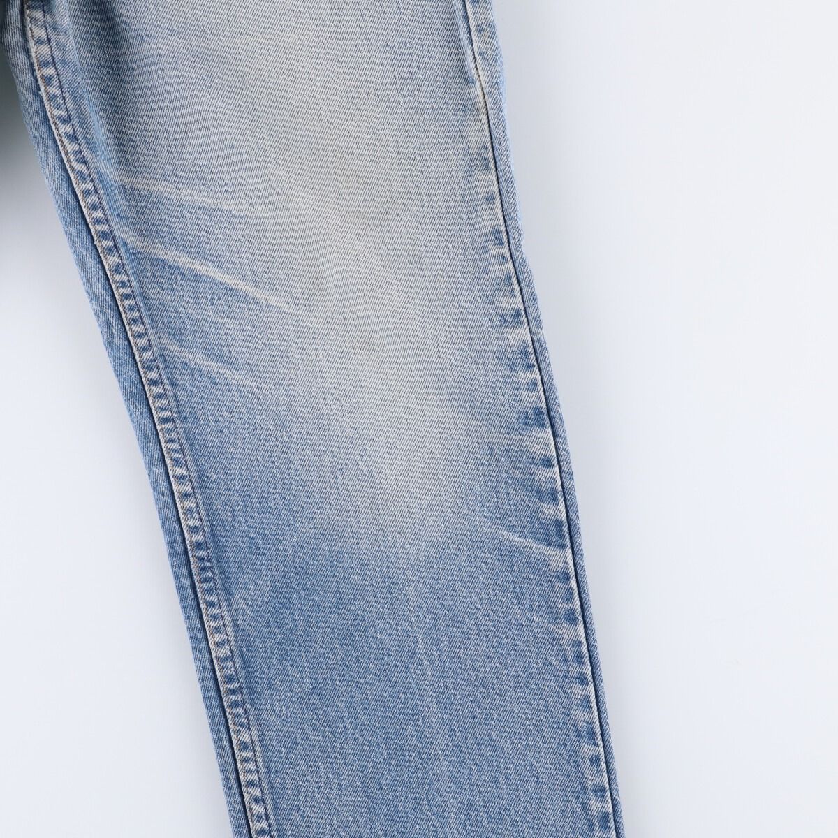 オレンジタブ テーパードデニムパンツ