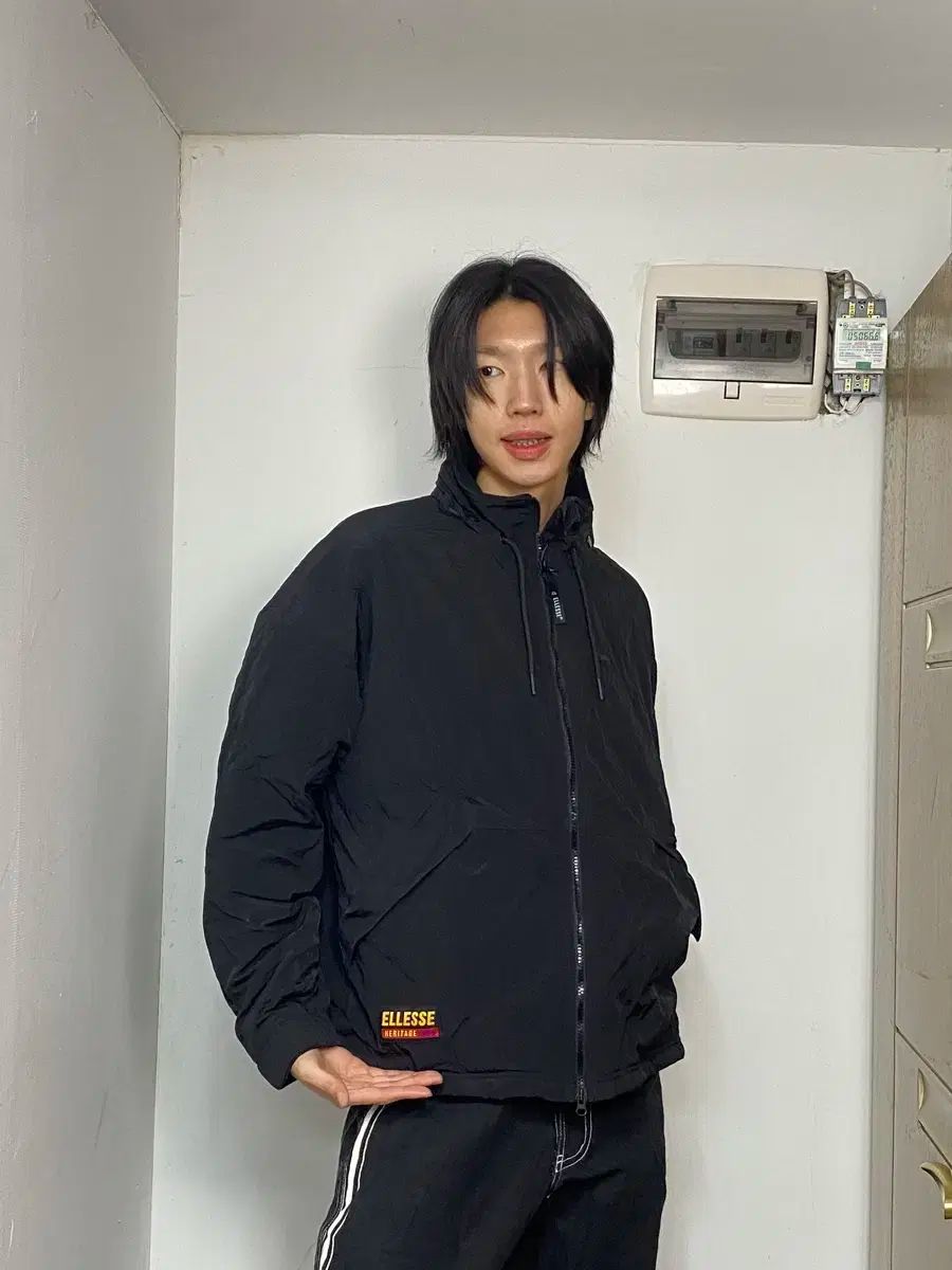 ellesse(エレッセ) 黒 ジャケット L