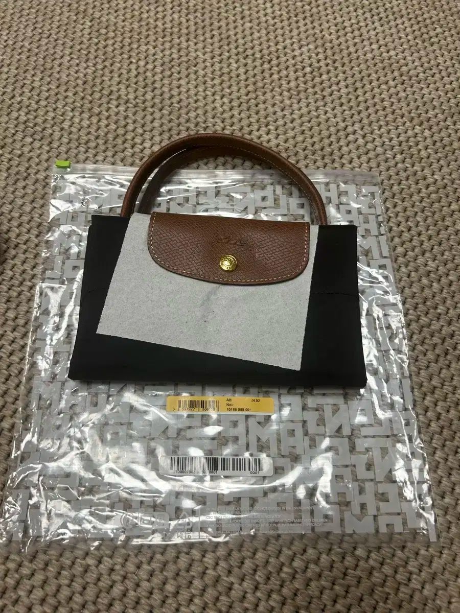 Longchamp ロンシャン または ル プリアージュ オリジナル M トップハンドルバッグ