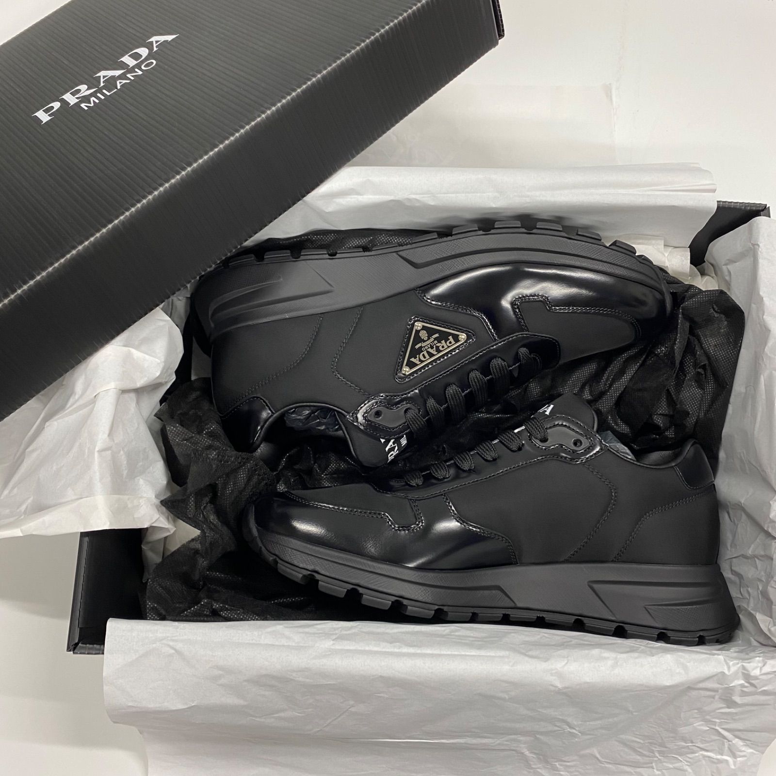 PRADA】プラダRe-Nylon xブラッシュドレザー メンズ スニーカー BLACK 