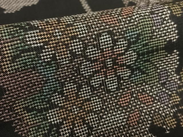 平和屋着物○本場大島紬 泥染め 9マルキ 雪輪重ね花文 黒地 正絹 逸品