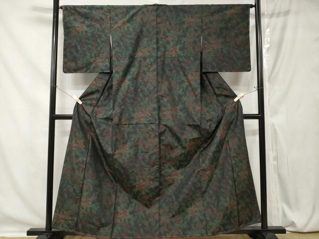 平和屋着物○本場大島紬 泥染め 植田絹織物謹製 草花文 証紙付き