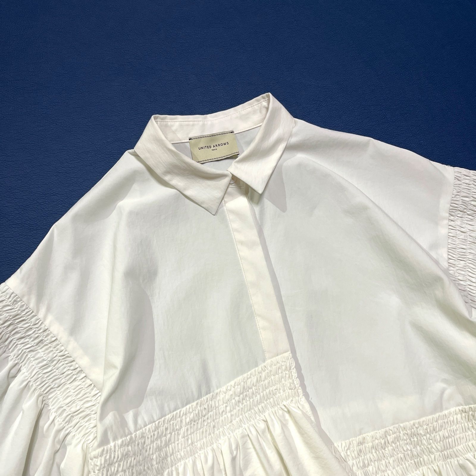 cE59 UNITED ARROWS 2024SS イレギュラー シャーリングブラウス