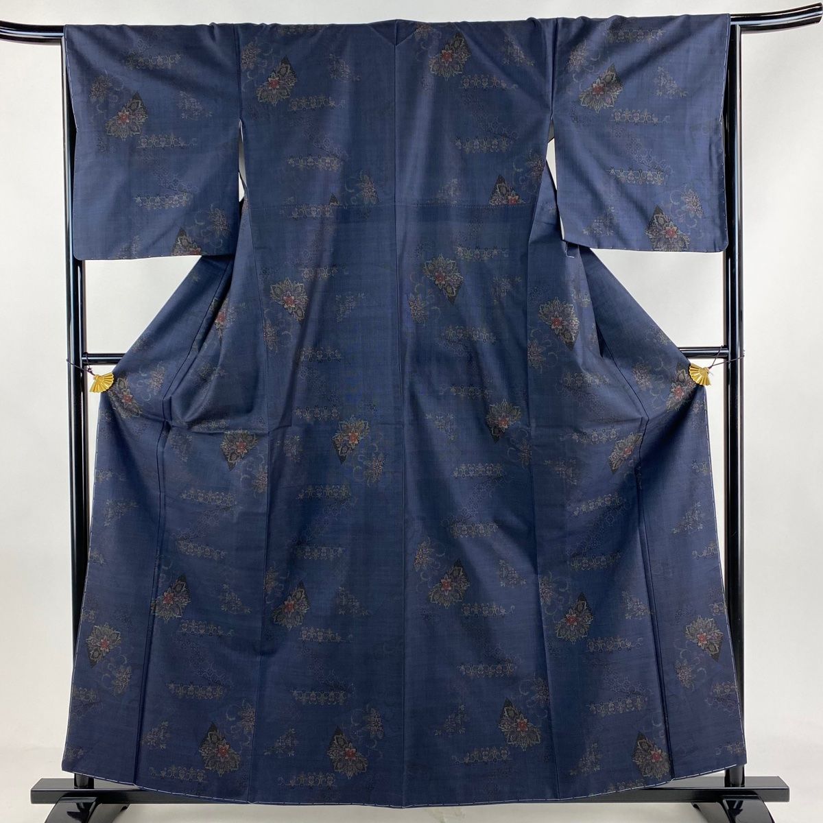 紬 身丈159.5cm 裄丈66cm M 袷 華文 花唐草 紺色 正絹 秀品