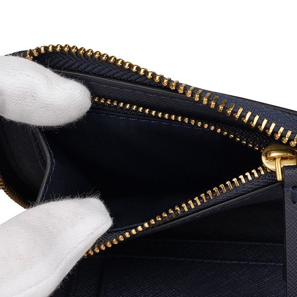 TORY BURCH 136098405 二つ折りラウンドZIP財布 - メルカリ