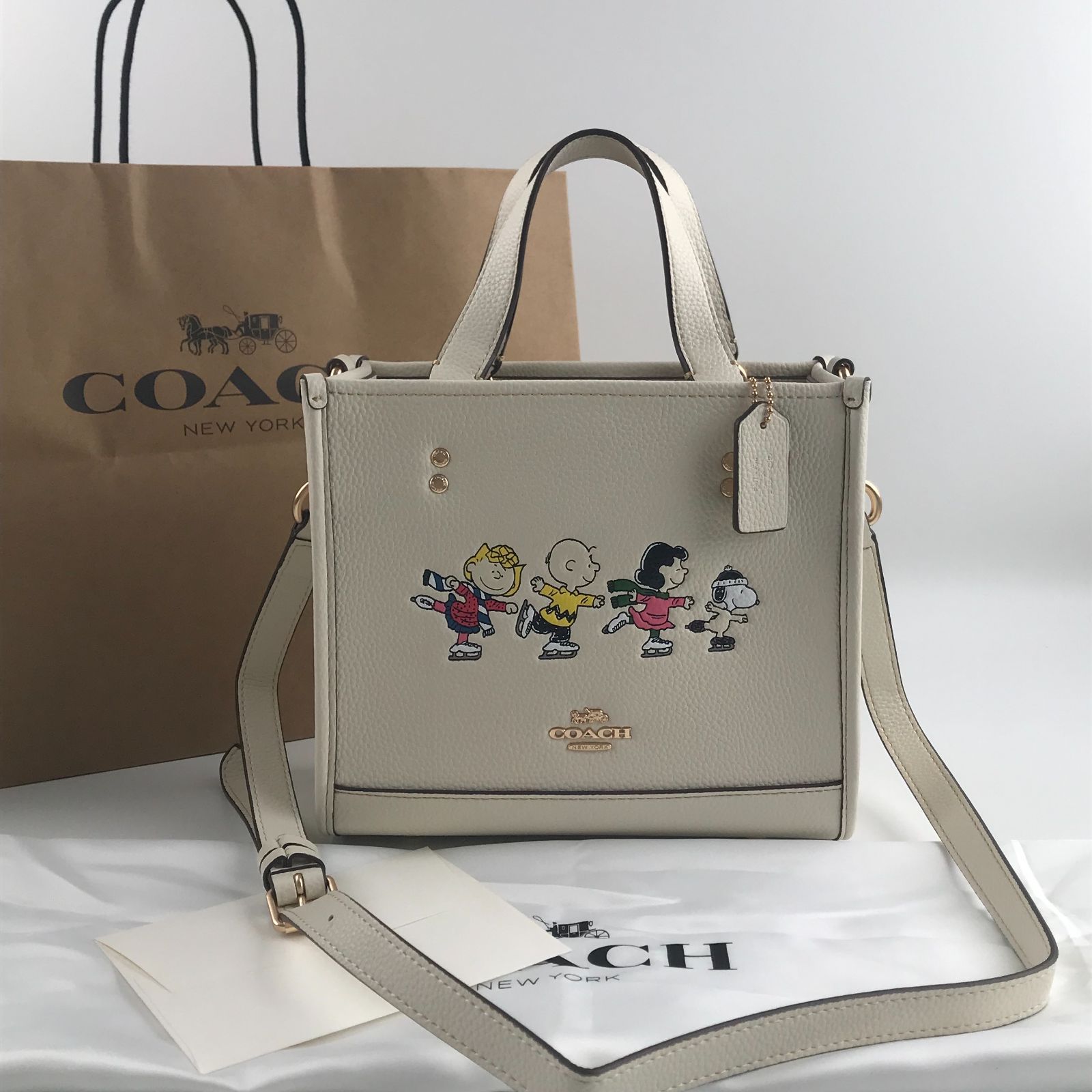 新品 COACH コーチ ピーナッツ コラボ デンプシートート 22 スヌーピー