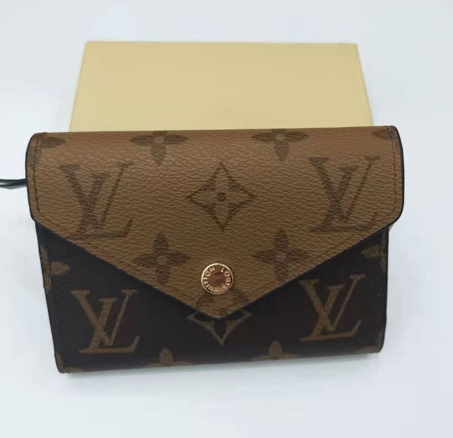 ルイヴィトン LOUIS VUITTON 三つ折り財布 モノグラム リバース ヴィクトリーヌ