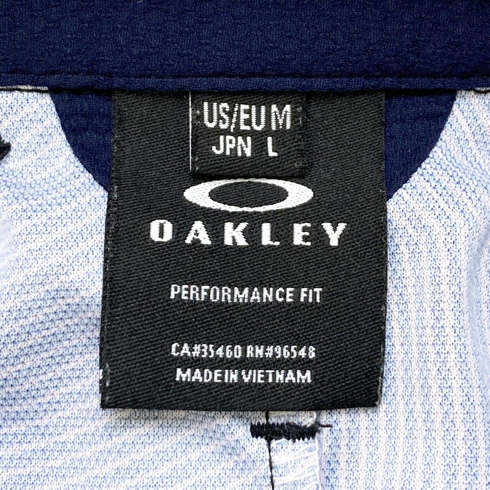 サイズ：L OAKLEY オークリー  半袖ポロシャツ スカル 総柄 パープル系 [240101373857] ゴルフウェア メンズ ストスト サイズ：L OAKLEY オークリー 半袖ポロシャツ スカル 総柄