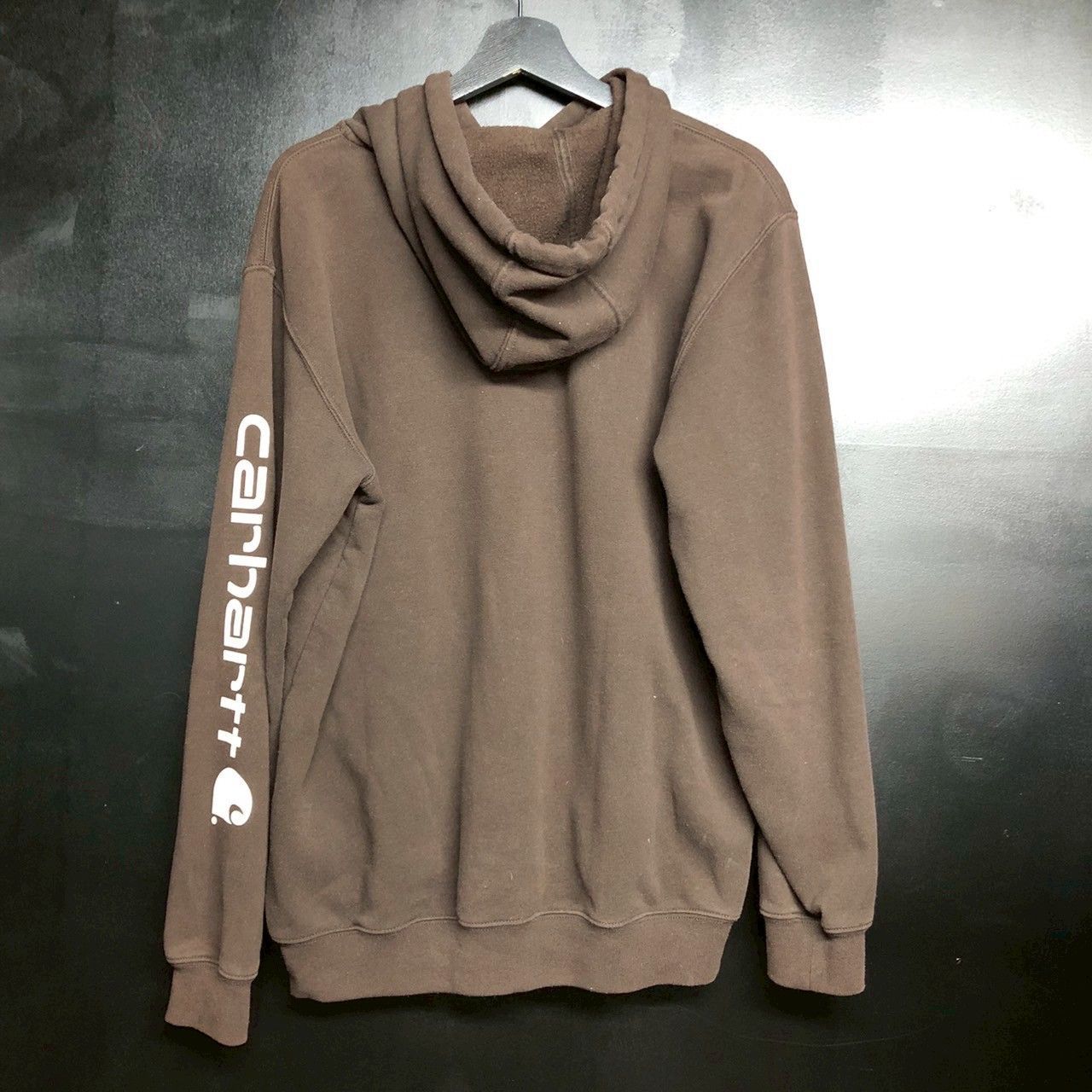 Carhartt カーハート ロゴ パーカー メキシコ プルオーバー ブラウン Carhartt カーハート ORIGINAL FIT ロゴスリーブパーカー