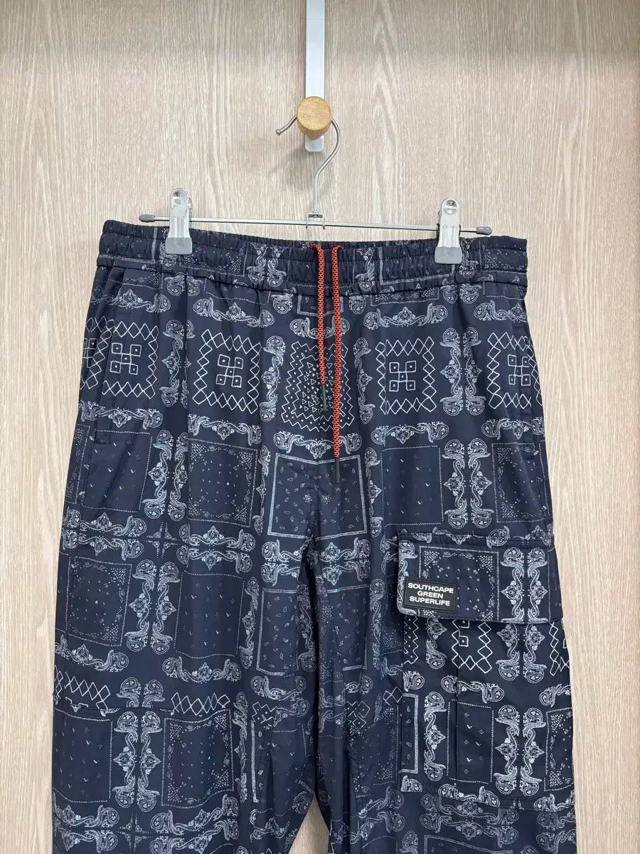 SOUTH CAPE レディース ゴルフ プリント ISTJ VENDING MACHINE Ver. ジョガーパンツS 67 ネイビー