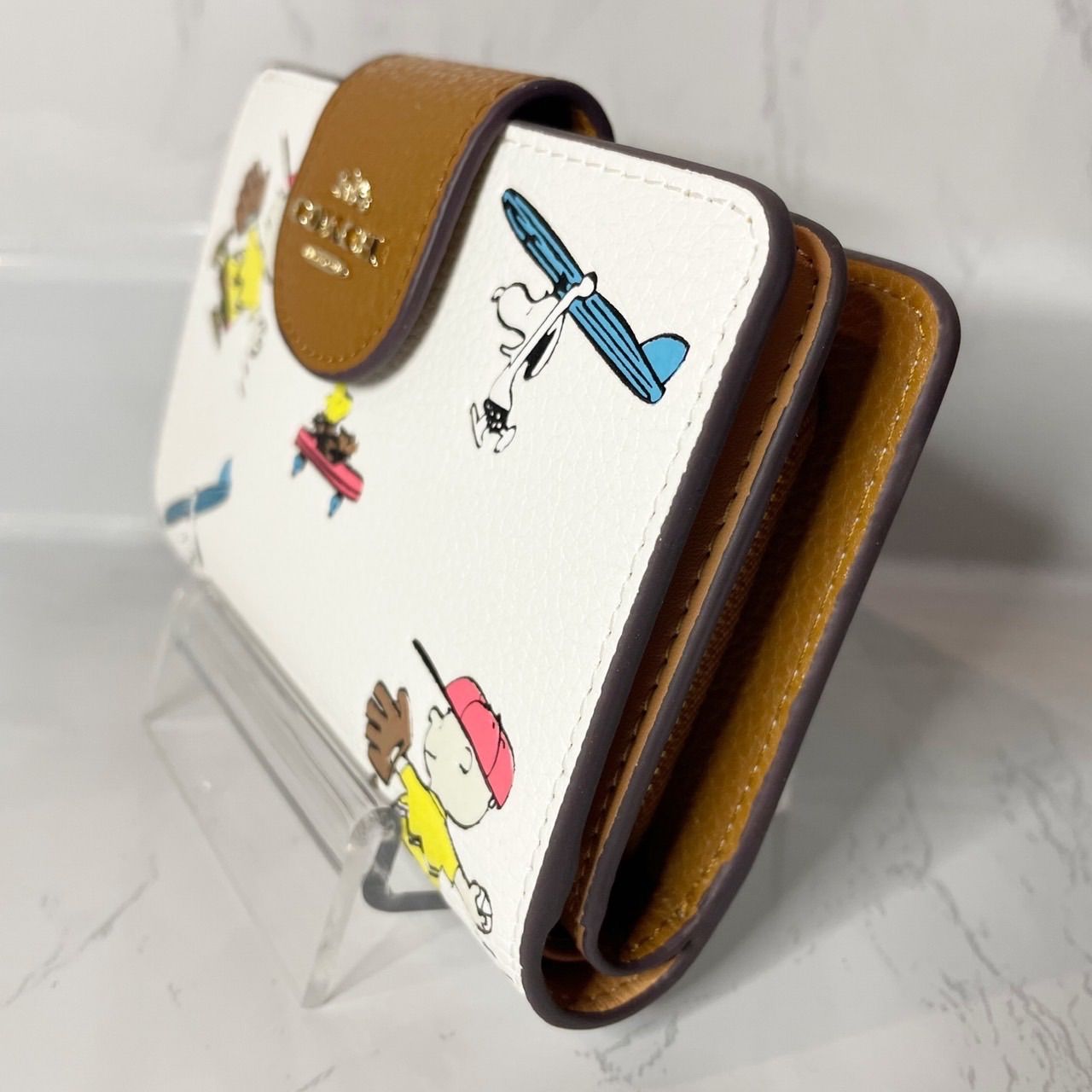 新品-未使用】COACH X PEANUTS コラボ 二つ折り財布 - Miki shop
