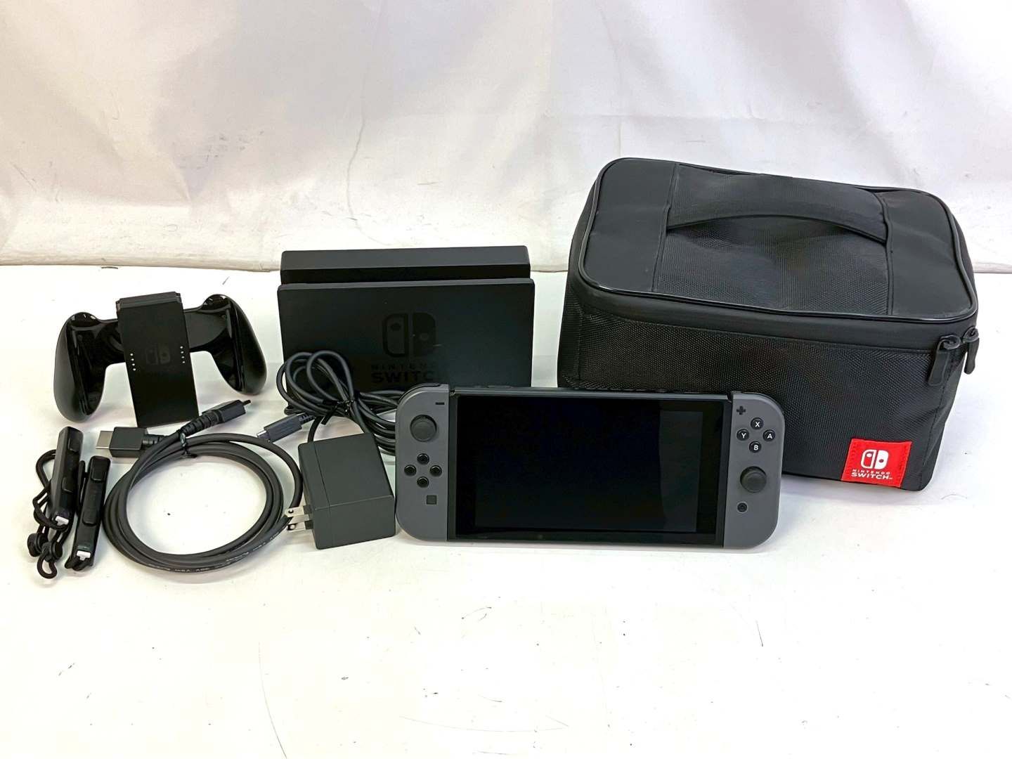 01w-4367 〇 Nintendo Switch ニンテンドースイッチ 本体 バッテリー増量モデル XKJ~ グレー 収納ケース付き 動作 済み