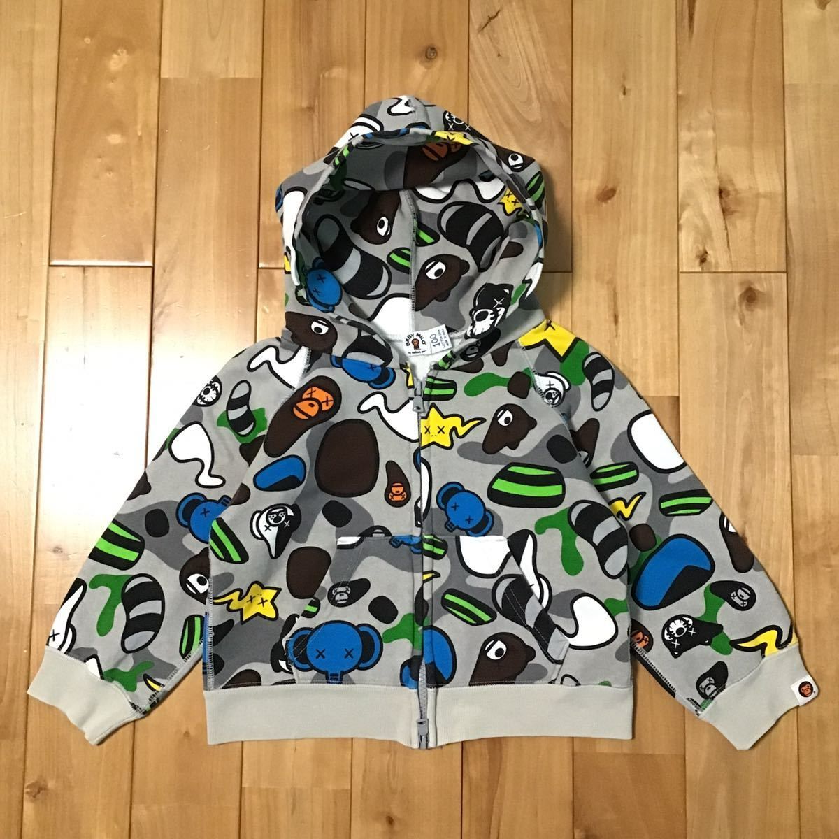 A BATHING APE エイプ×KAWS カウズMILOパーカー(M) - パーカー