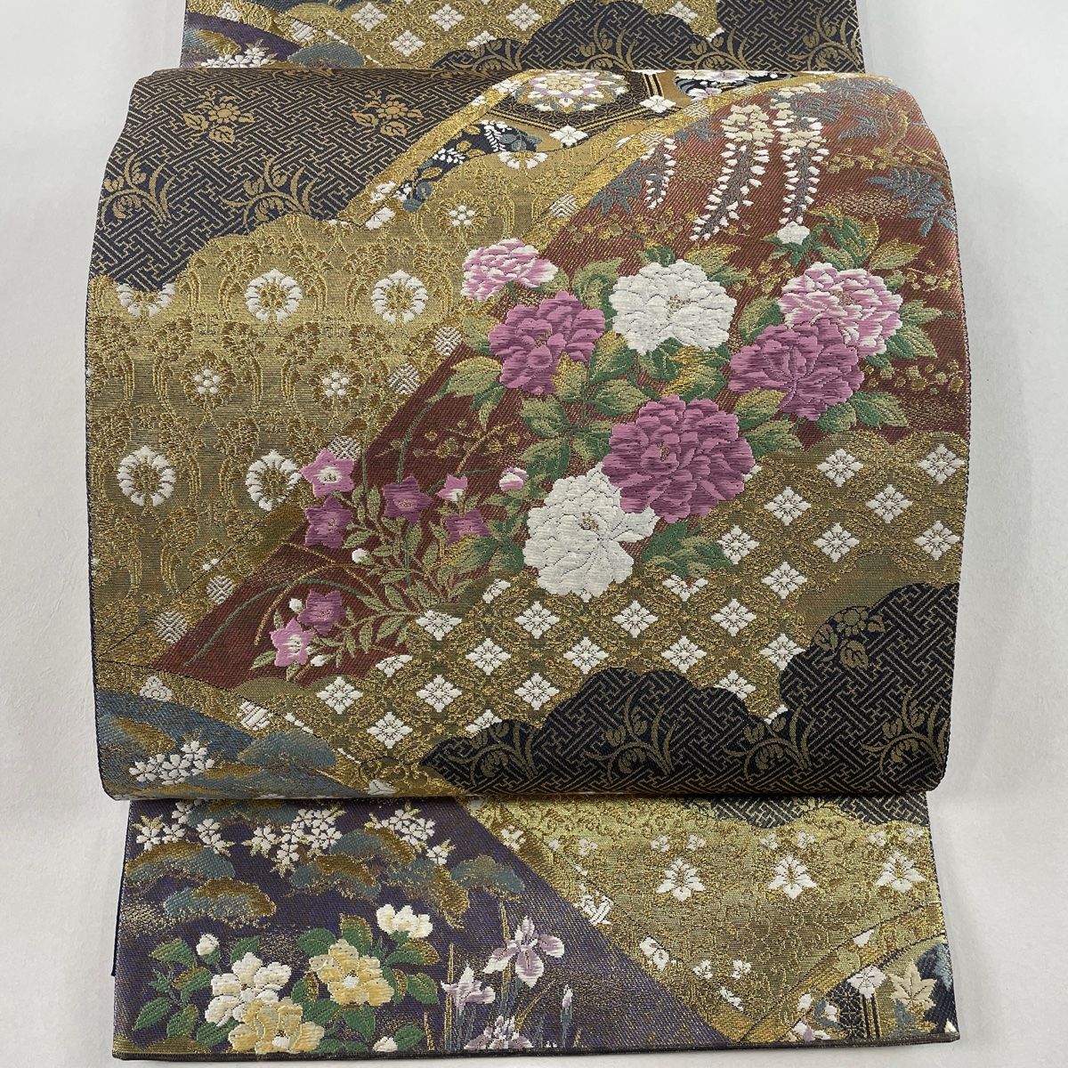 袋帯 美品 名品 じゅらく 落款 帝王紫 草花 観世水 唐織 金銀糸 灰紫