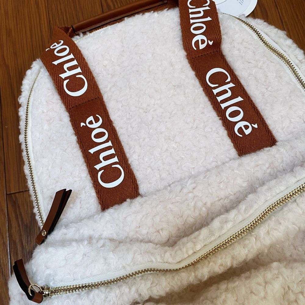 新品タグ付】CHLOE クロエ ムートン ロゴプリント バッグパック