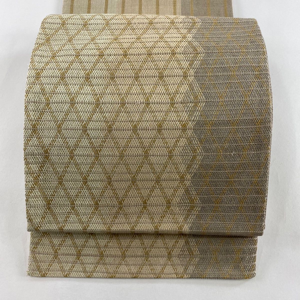 袋帯 秀品 幾何学 金糸 薄茶色 六通 正絹