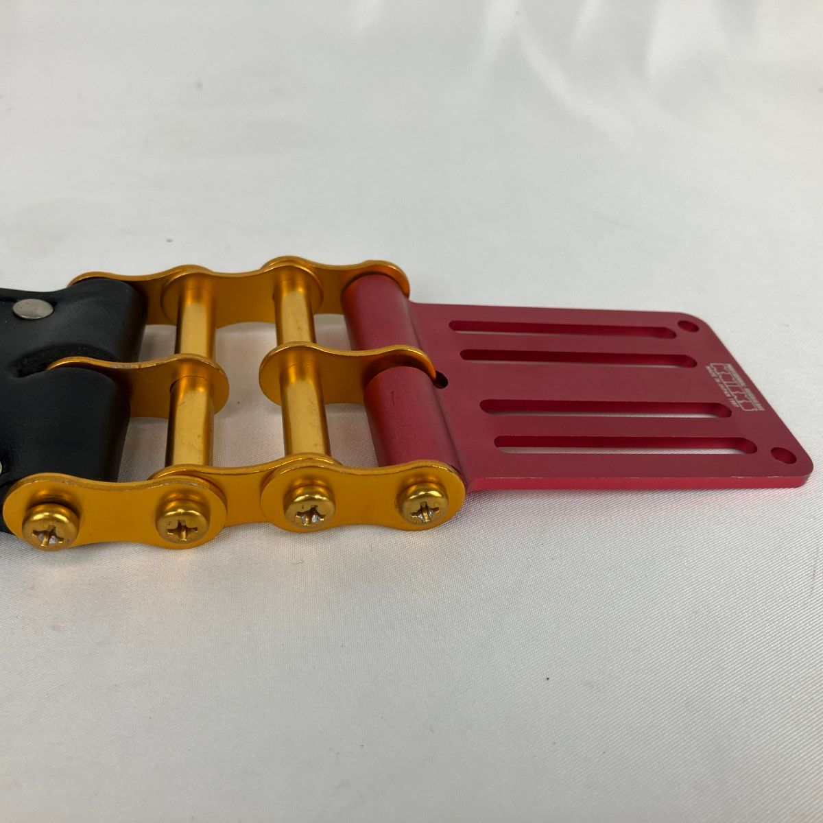 ЗЗKNICKS 5分～1寸用 ヌメ革 ノミホルダー ベルトループ・チェーン金具付き KB-010DX ブラック×レッド×ゴールド ЗЗKNICKS 5分～1寸用 ヌメ革 ノミホルダー ベルトループ・チェーン金具