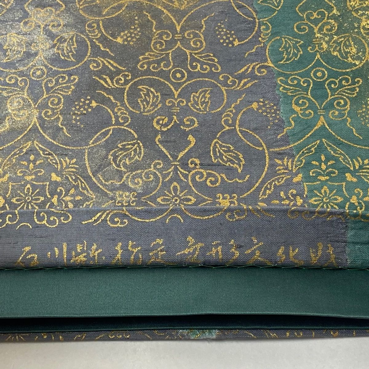 牛首紬　袋帯　逸品　超美品　紬　洒落袋帯　正絹　牛首証　落款 袋帯 美品 逸品 牛首紬地 よろけ縞 幾何学模様 金彩 赤茶 全通