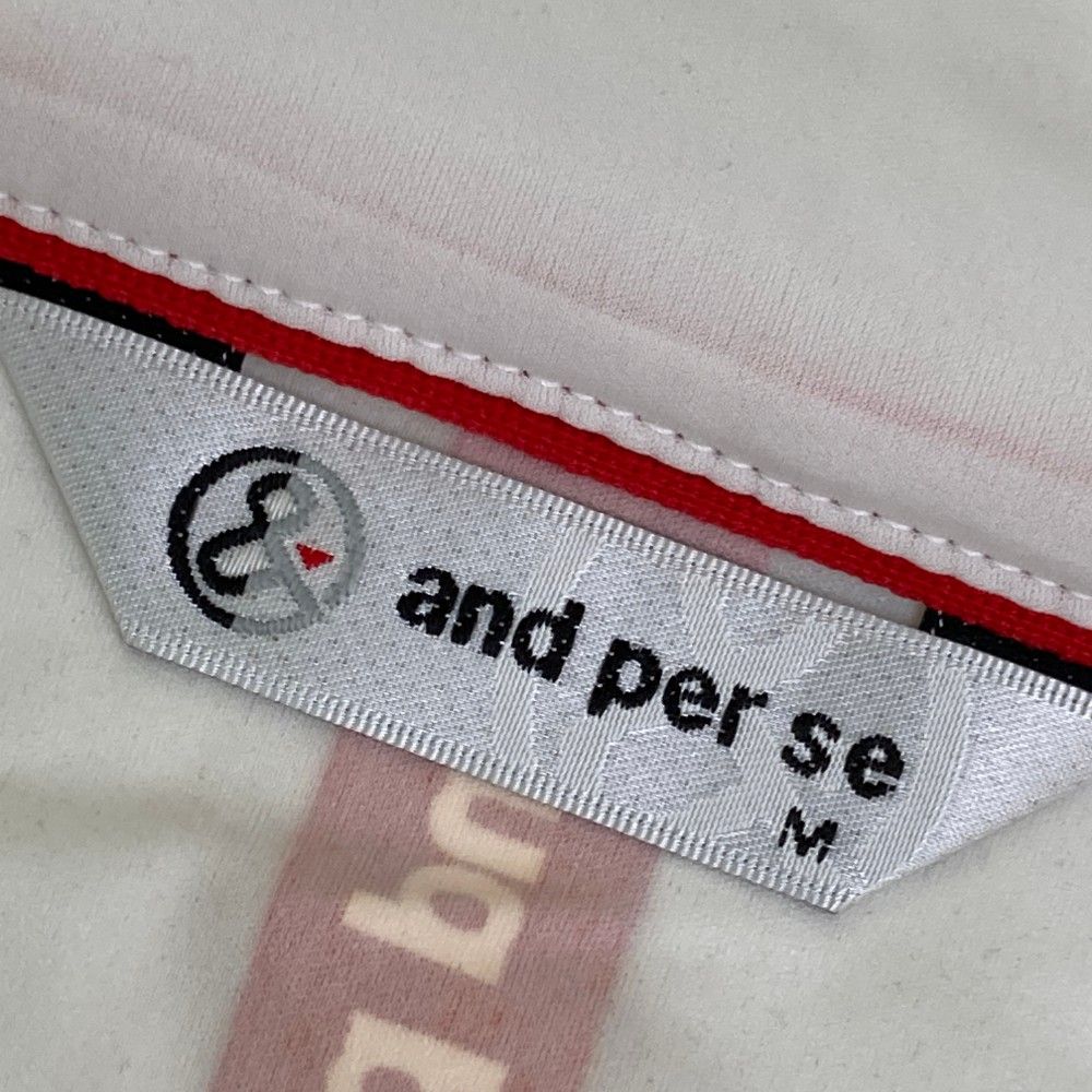 サイズ：M AND PER SE アンパスィ  長袖 ジップジャケット 総柄 ホワイト系 [240101446203] ゴルフウェア メンズ ストスト サイズ：M AND PER SE アンパスィ 長袖 ジップジャケット 総柄